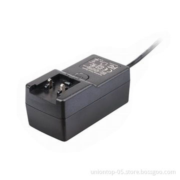15V/1.2A power adapter with interchangeable plugs of US/EU/AU and UK